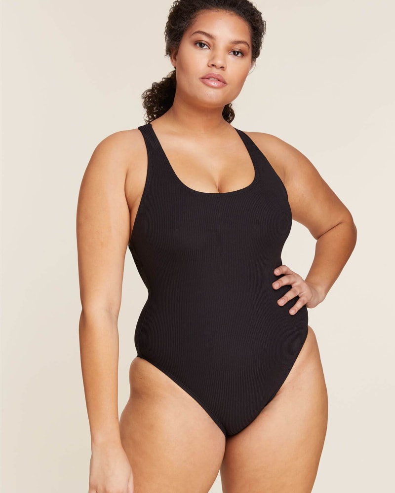 Front of a model wearing a size L The Tulum Ribbed Classic in Black by Andie Swim. | dia_product_style_image_id:253391